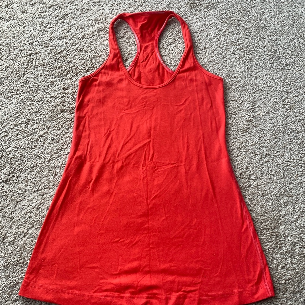 small bright orange red lululemon workout tank